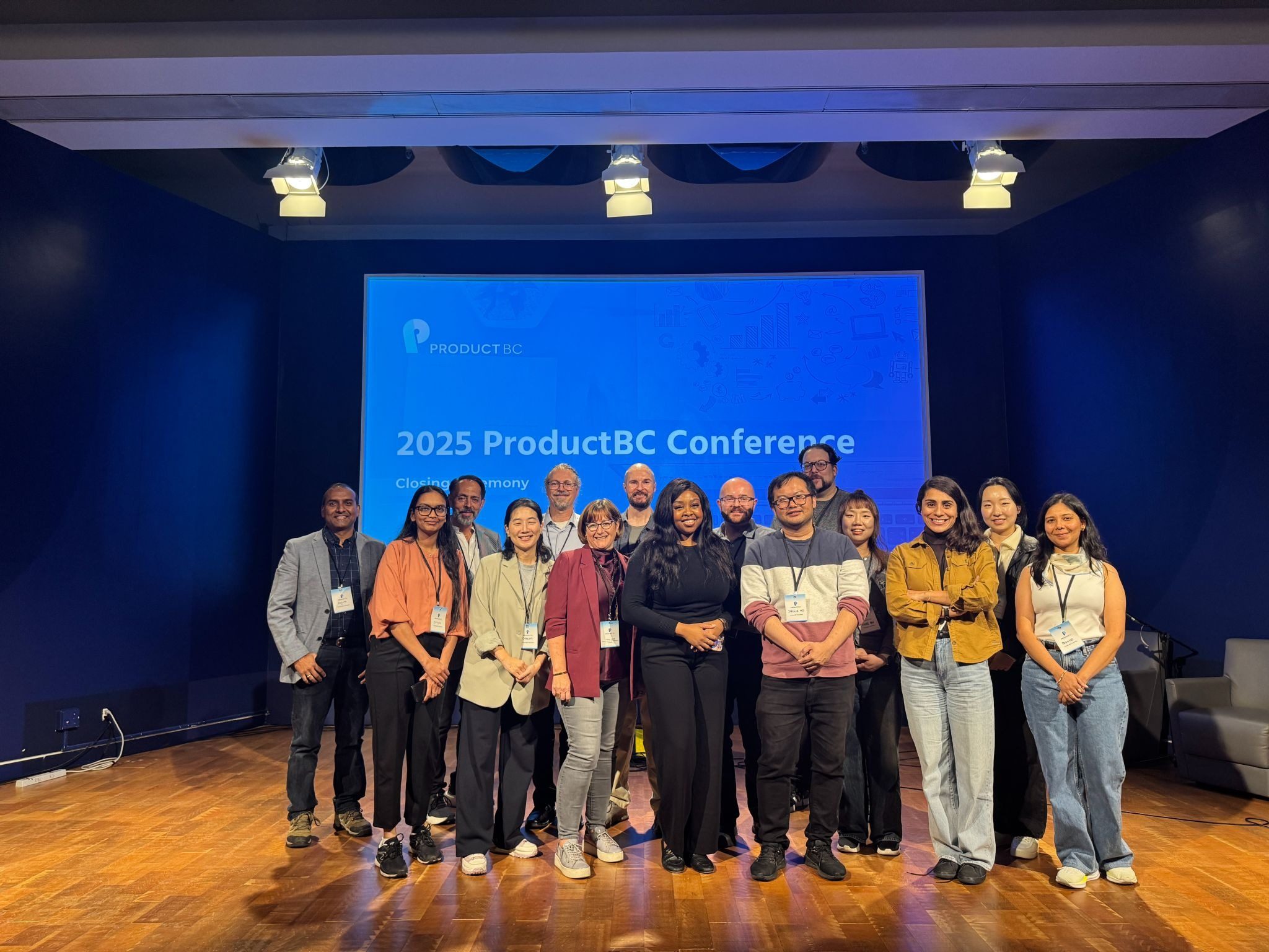 Speakers and the ProductBC team on stage for the closing ceremony.